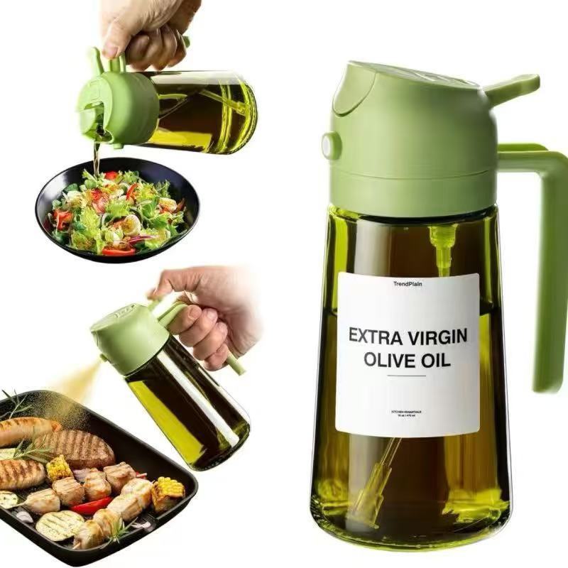 Green AeroMist oil sprayer pouring a clean drizzle of oil over a salad